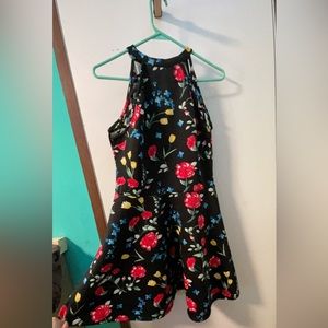 No boundaries black dress with yellow and red flowers sleeveless and knee length